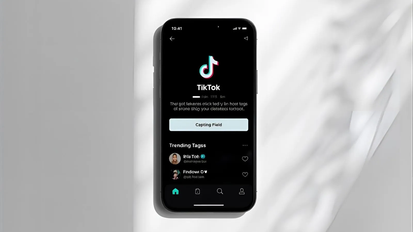 Flat-lay of phone with TikTok caption box and short hooks notebook